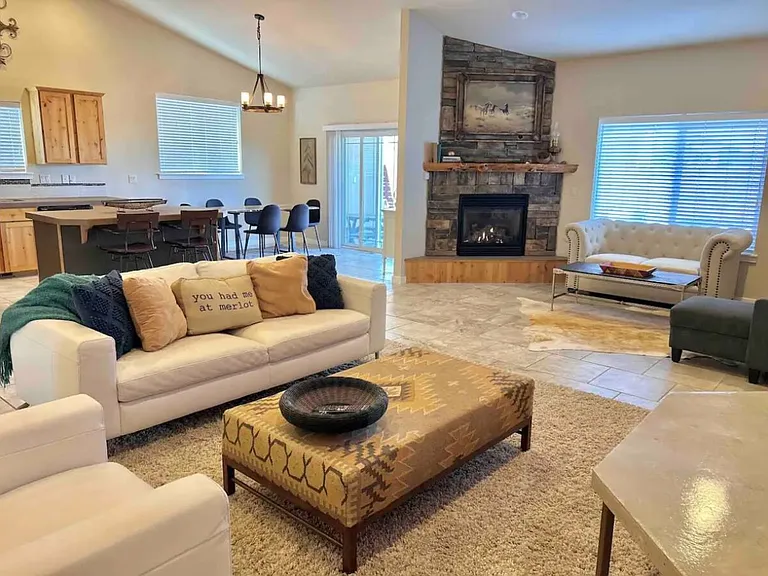 Open floor plan, vaulted ceiling, living room area