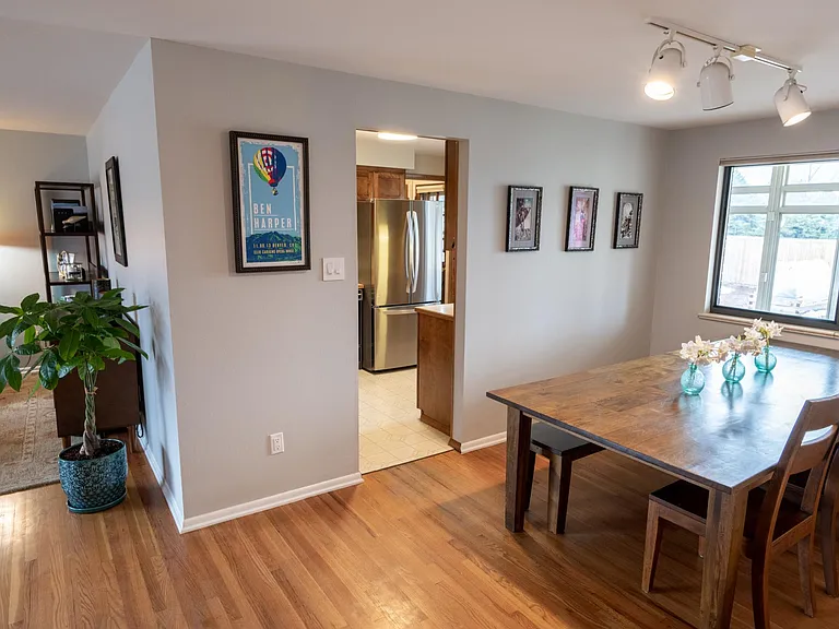 Dining room, living room, kitchen, sun room, garden.
