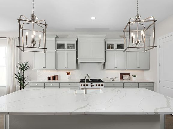 Kitchen with upper glass cabinets