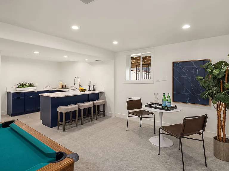 A lower level for the kids, or perhaps some of the adults entertainment. The kitchen is "kid safe"