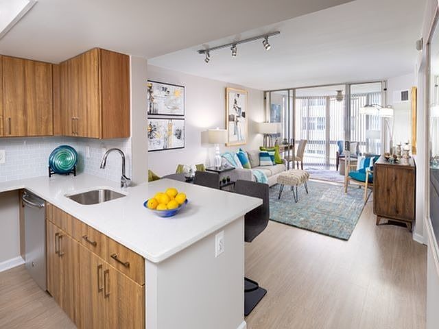 Renovated Apartments With Quartz Countertops, Energy Efficient Stainless Steel Appliances and Wood-Style Flooring Throughout Kitchen and Living Areas