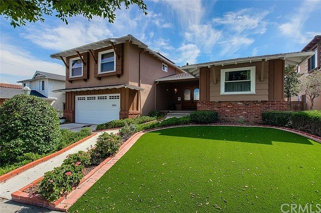 Welcome to 24012 Sandhurst Lane in highly desirable Palo Del Amo Woods.  This popular and tastefully decorated, split level home is located on a quiet, interior street, centrally located in this well maintained neighborhood.