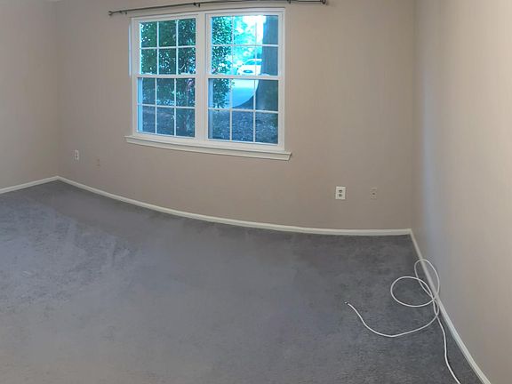 Master bedroom with large double window