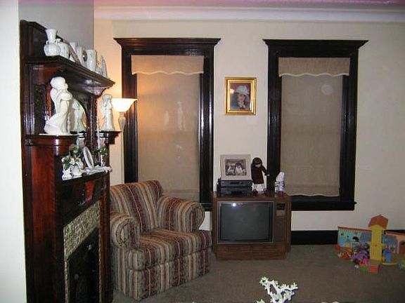 Living Room with original wood molding