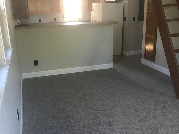 Living room facing kitchen