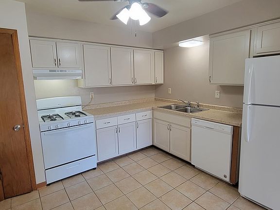 Kitchen has been redone, ceiling fan, like new appliances including dishwasher and gas stove.