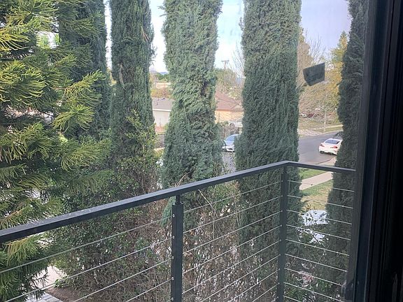 modern balcony overlooking quiet street