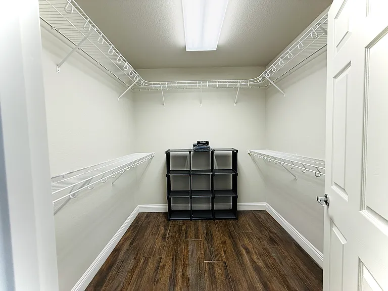 Huge Walk-In Closet to fit all your shoes, clothes, and room for storage.