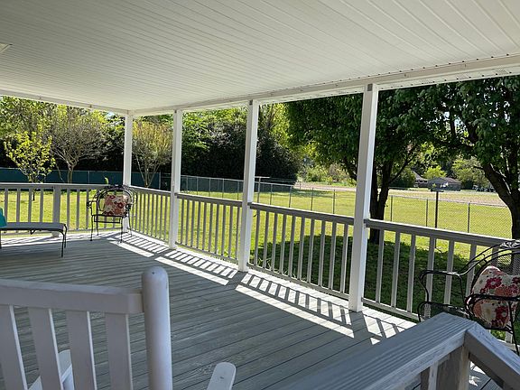 Large covered deck overlooking farmland. Walk to Wilsons Farm store and buy fresh vegetables!