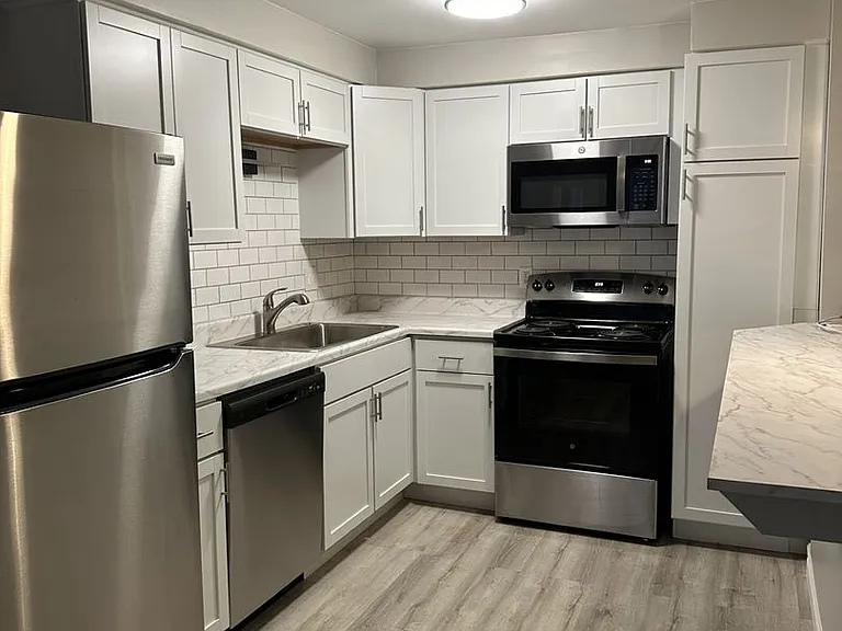 Villager Apartments — Photo 1