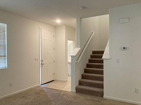 Front door entry with 1/2 bath off entry.