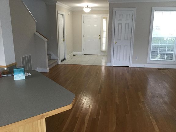 View from Breakfast Nook of front door entrance, Garage entrance, Den area.