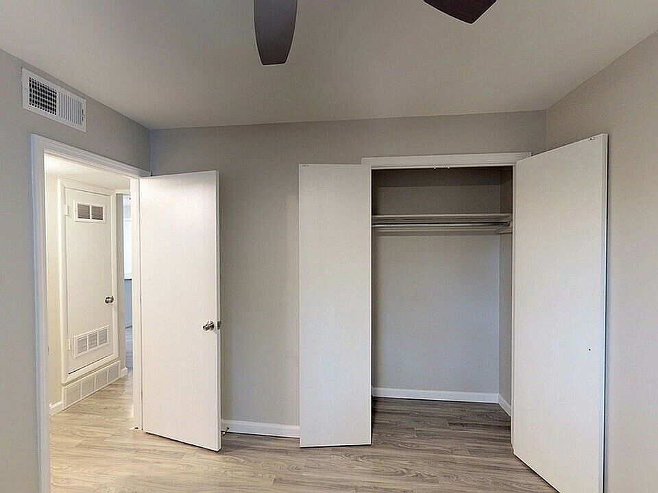Step into modern elegance with this beautifully designed bedroom featuring ample storage.