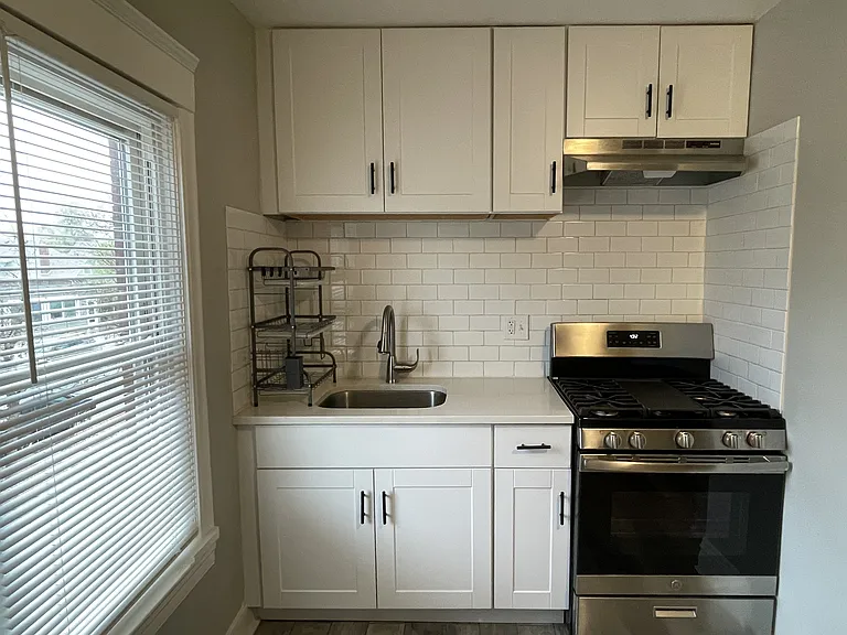 Kitchen with full size gas stove
