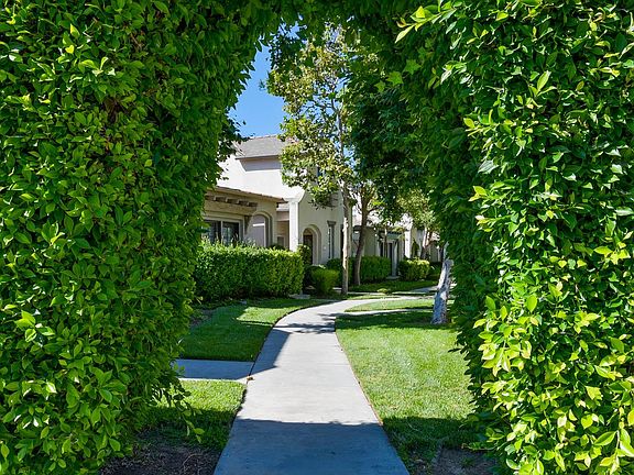 Elegant archway welcome you into this special neighborhood within walking distance to both Canyon View Elementary school and national-ranked Northwood High School.