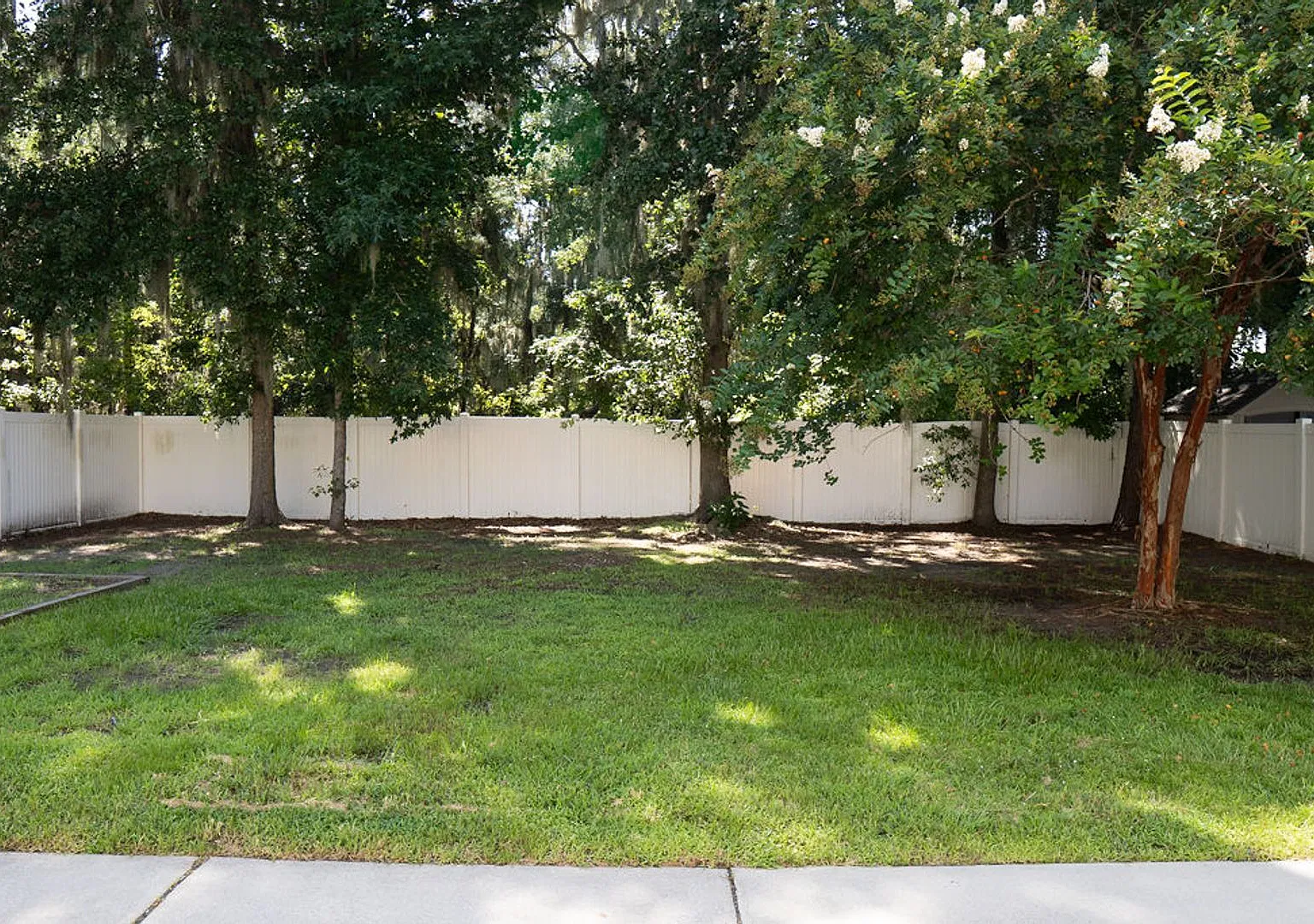 Available Now Spacious 4-Bedroom Home With Fenced Yard & Pond Views! — Photo 3