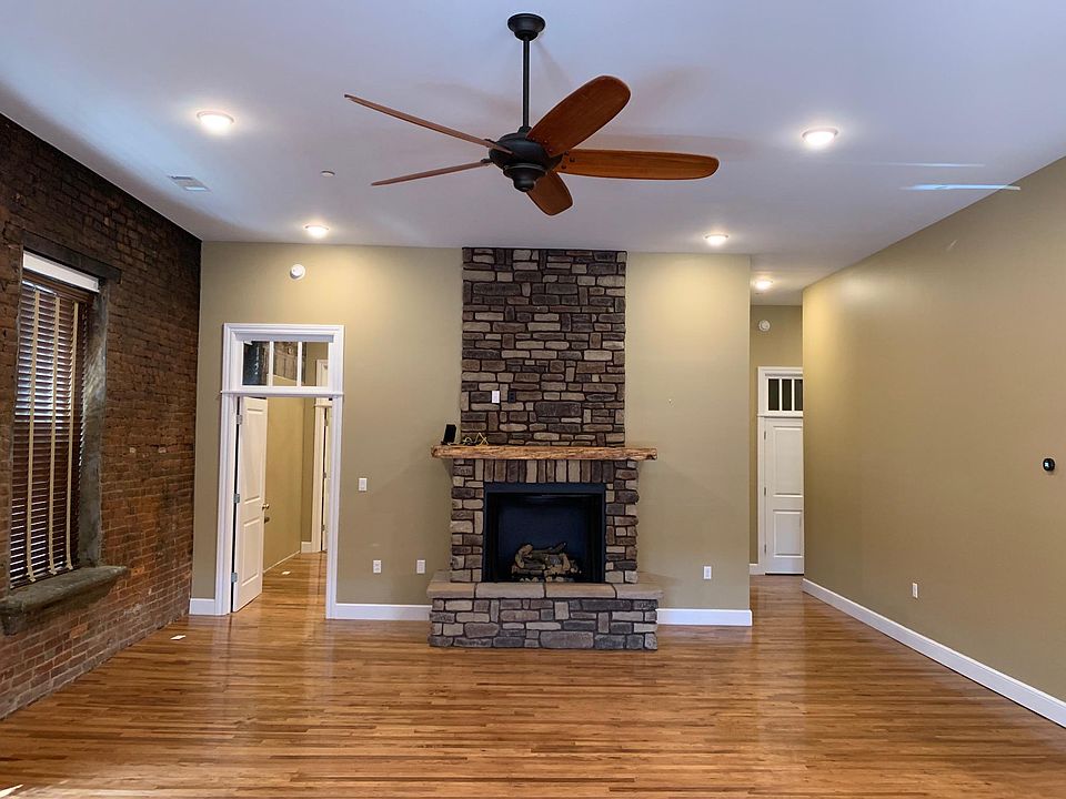 Main living area. Entrance to the right. Master bedroom and bathroom is located through the doorway on the left.