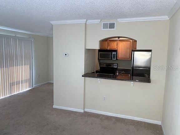 3rd image of 10195 Sailwinds Blvd N APT 107