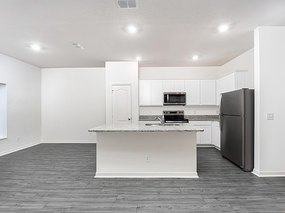 Chef-ready kitchen and adjoining dining room