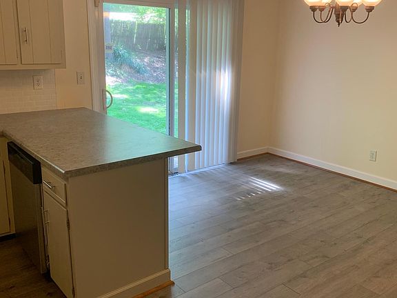 Large dining area with access to backyard