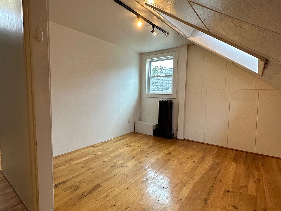 Bedroom with skylight - fits queen bed.