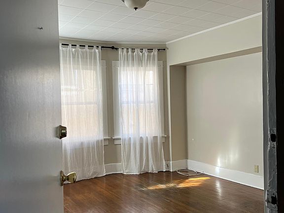 Front door open to the living room