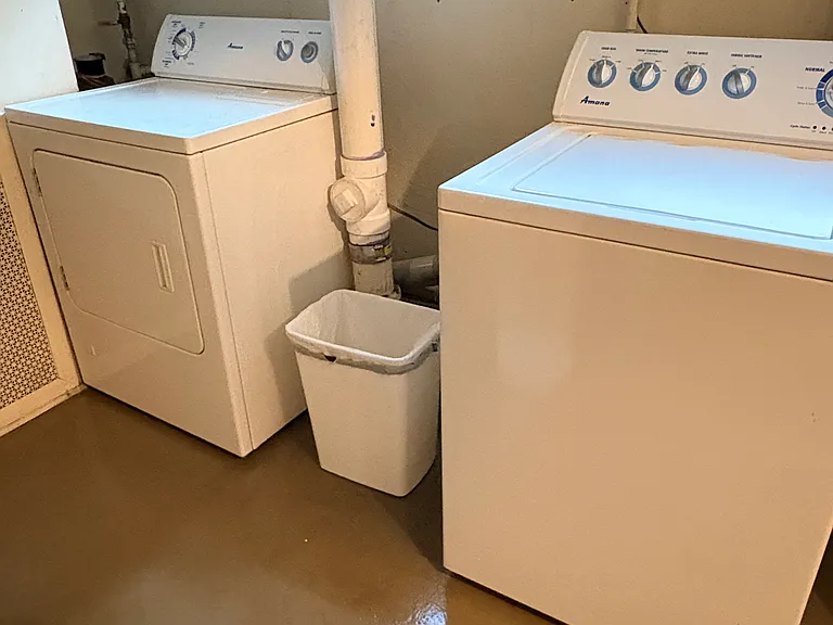 Washer and dryer just off kitchen.