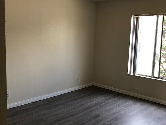 master bedroom new wood flooring throughout downstairs