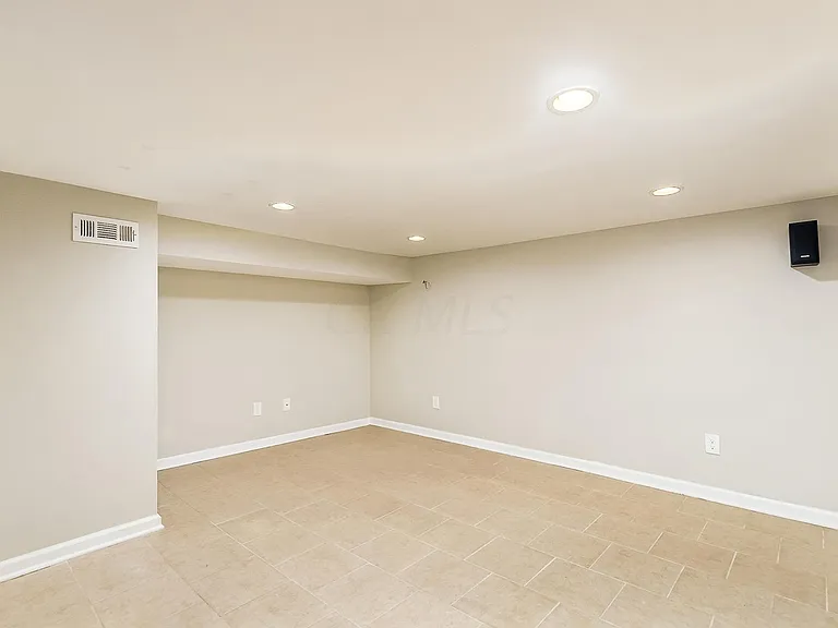 Lower level has been used as a guest room and home office
