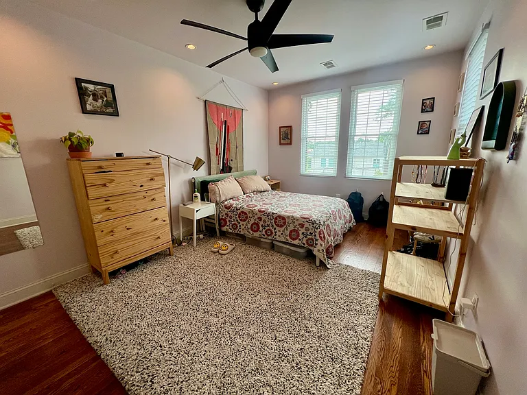 Corner bedroom with walk-in closet
