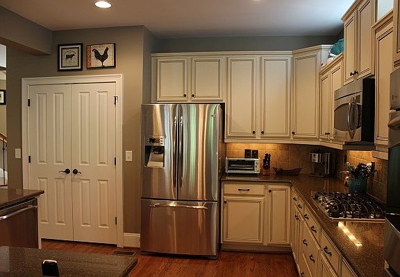 French door refrigerator and double door pantry for storage