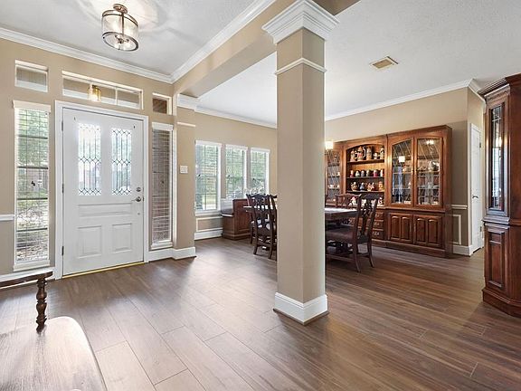Several windows allow for tons of natural light keeping the entry nice and bright! Updated light fixtures throughout most of the home.