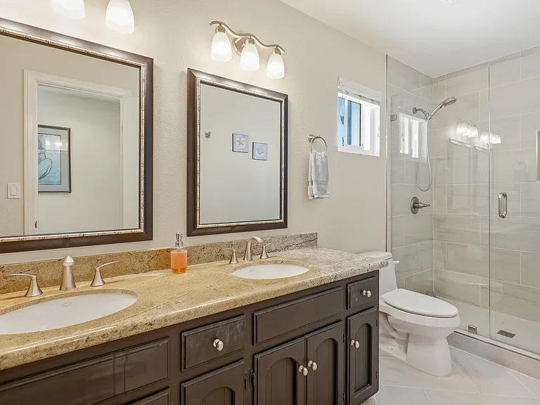Primary bathroom - double sink with large shower.
