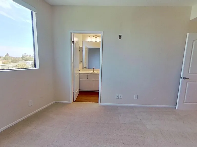 Primary bedroom with en-suite in apartment #319