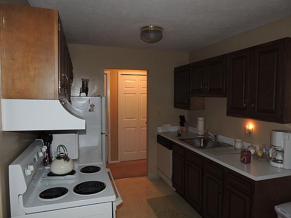 Kitchen with Fridge, Stove, and Dishwasher