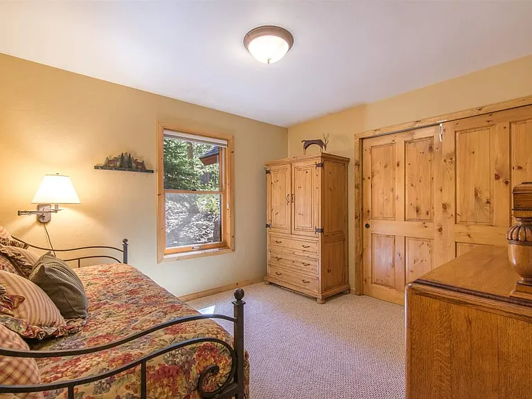 Bedroom 1 with trundle bed. 
Trundle bed is shown as a single bed.