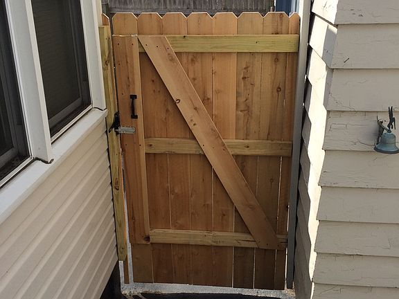 Wooden hate to back yard