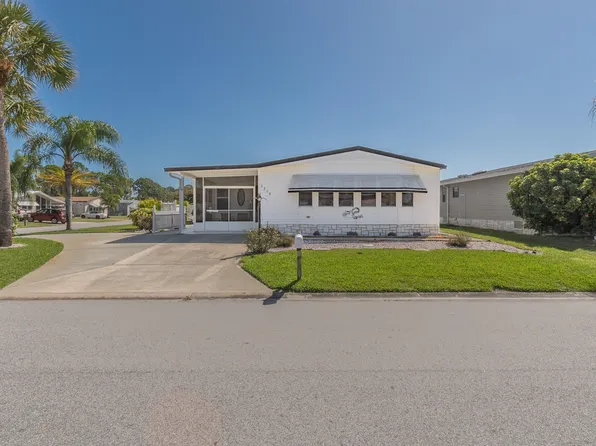 1213 Areca Dr, Barefoot Bay, FL 32976