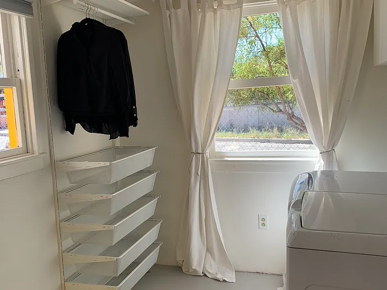 Mud room with washer/dryer + storage space