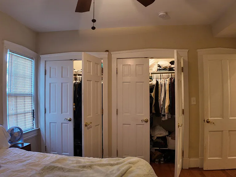 Master bedroom with ample closets