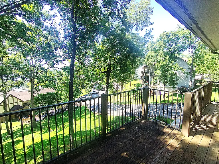 Rear deck with access from living room and bedroom