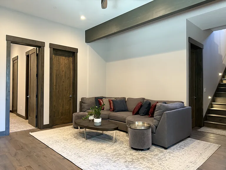 second living area - complete with a gas fireplace and direct access to the lower level patio and seating area