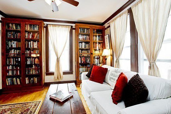 Formal living room with built-in library cases