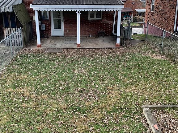 View of back of duplex from yard