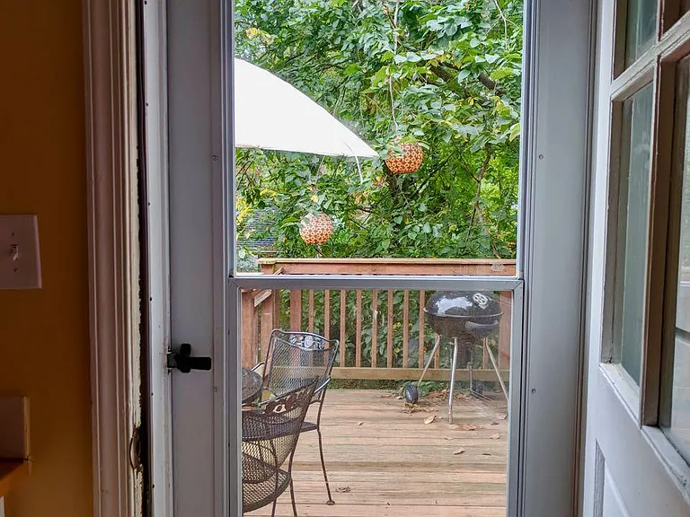 The upstairs deck is off the kitchen.