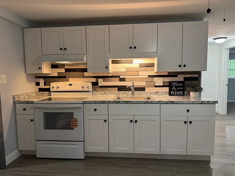 New Kitchen with New appliances. Soft closing doors.