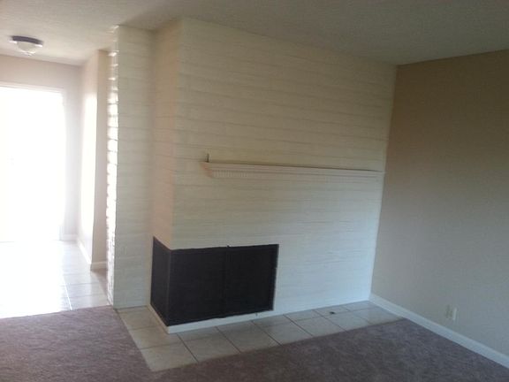 cozy living room with piped gas fireplace