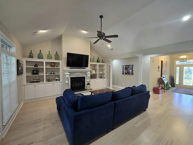 Living rm w/gas fireplace & built-ins