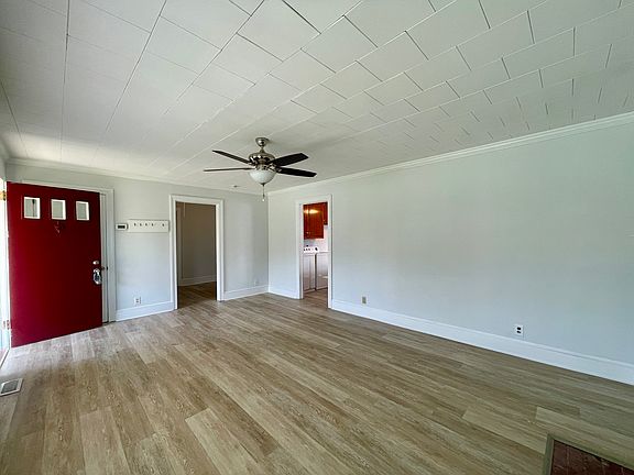 Living Room with new fan and new luxury vinyl flooring