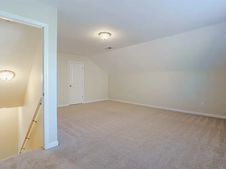 Extra large upstairs bedroom with spacious closet and full bathroom.